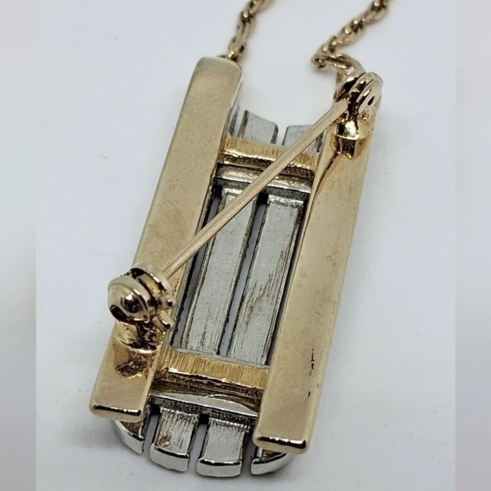 * Vintage Lady Remington Winter Sled Pin Brooch